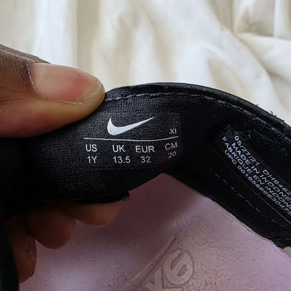 Nike Pink Foam Slip-On Sandals